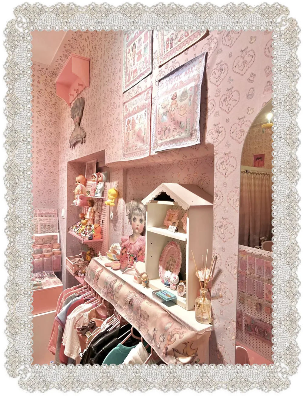 RudeFish shop interior with dolls and a miniature house display